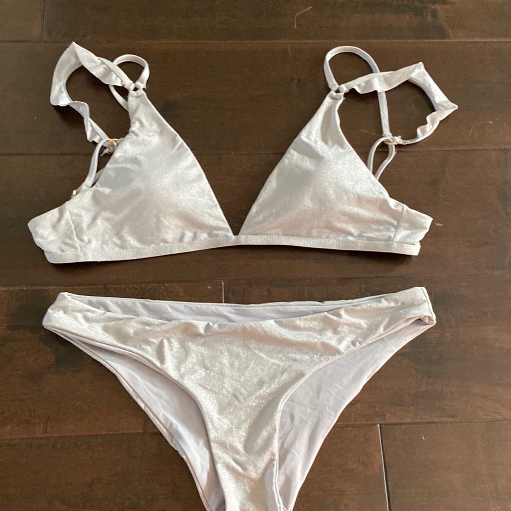 Two piece swim suit. Tags cut off. Its either vit A or a Lswim (one of the exp)